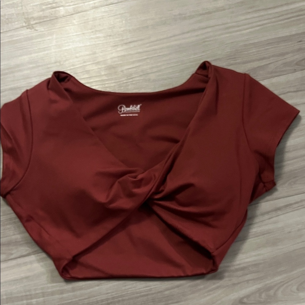Bombshell sportswear 
Red Twist Front Top